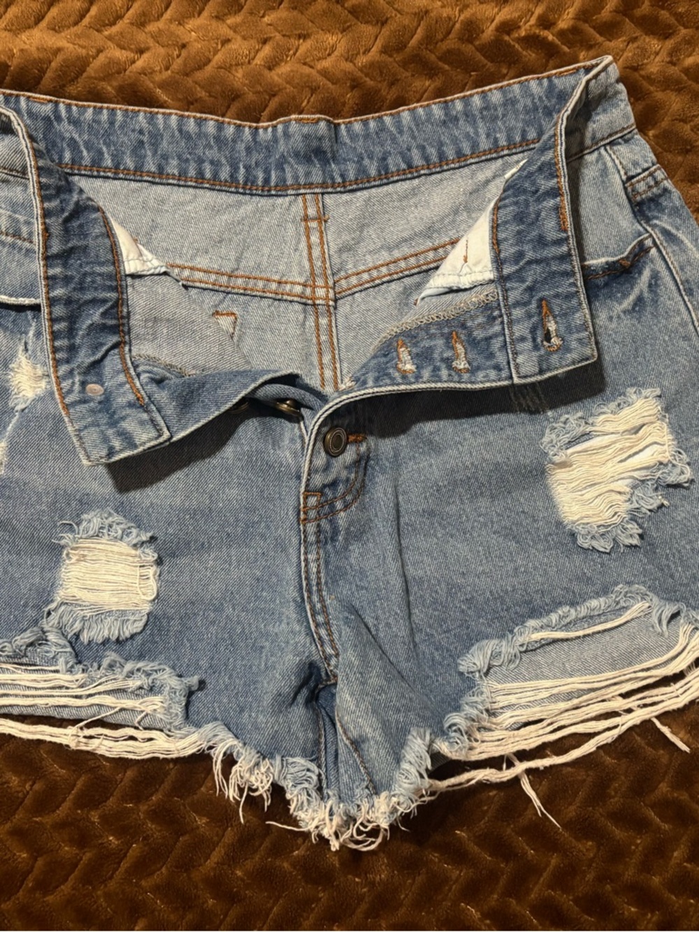 Women's Distressed Light Blue Denim Shorts